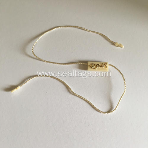 Plastic sales tags with strings